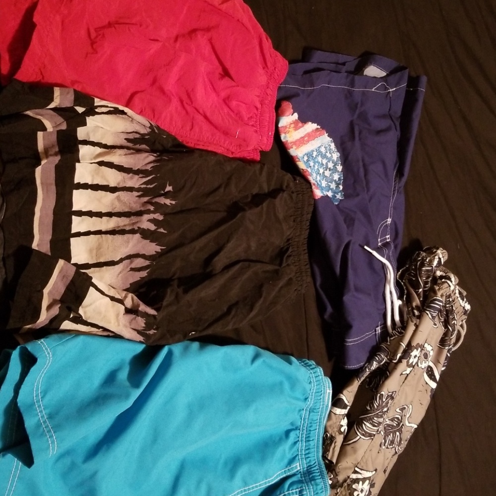 5 pairs of swim trunks.
